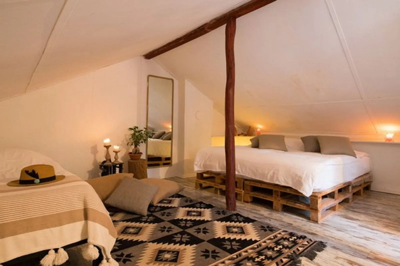 Stone House Attic: attic bedroom under a sloping roof