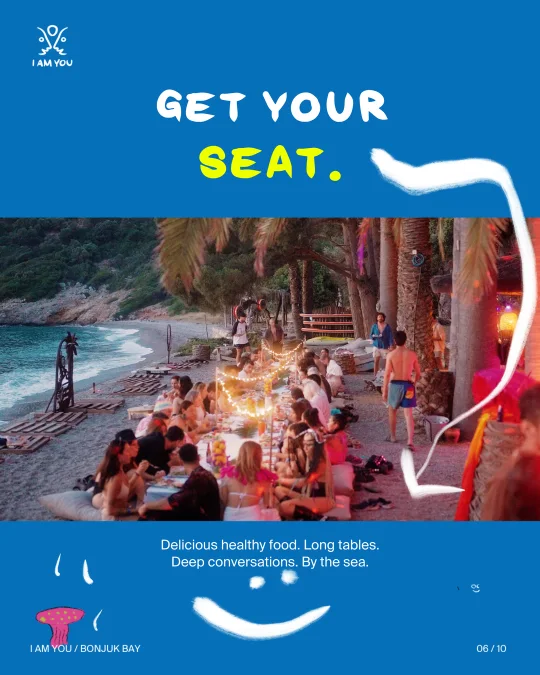 Healthy food, long tables and conversations by the sea