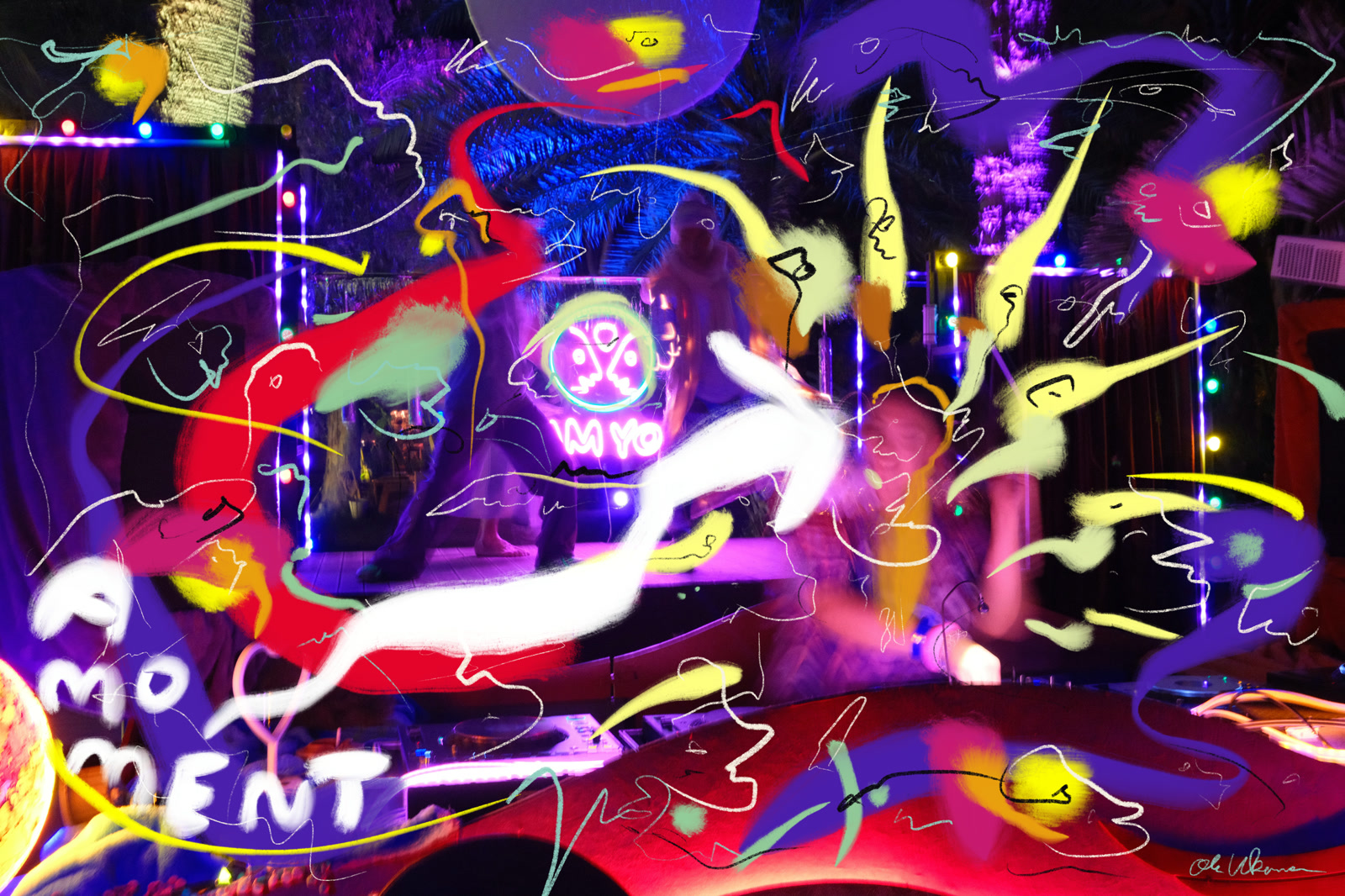 The I AM YOU booth transformed with bright painted figures and the handwritten words A MOMENT
